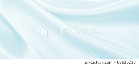 Smooth elegant blue silk or satin luxury cloth texture as abstract background. Luxurious background design Smooth elegant blue silk or satin luxury cloth texture as abstract background. Luxurious background design 69620236