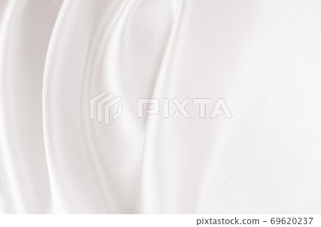 Smooth elegant golden silk or satin luxury cloth texture as wedding background. Luxurious background design. In Sepia toned. Retro style 69620237
