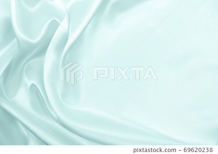 Smooth elegant blue silk or satin luxury cloth texture as abstract background. Luxurious background design Smooth elegant blue silk or satin luxury cloth texture as abstract background. Luxurious background design 69620238