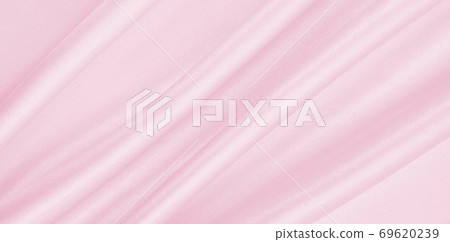 Smooth elegant pink silk or satin texture as wedding background. Luxurious background design Smooth elegant pink silk or satin texture as wedding background. Luxurious background design 69620239