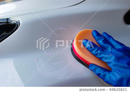 Waxing and spreading after car wash Waxing and spreading after car wash 69620821