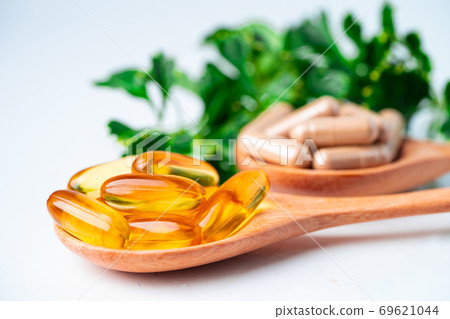 Alternative medicine herbal organic with vitamin E omega 3 fish oil, mineral, drug with herbs. 69621044