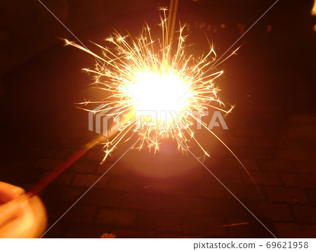 A beautiful moment of hand-held fireworks in summer 69621958