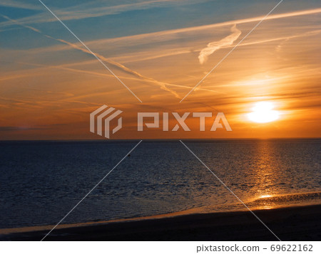 The sea and a beautiful sunset. 69622162