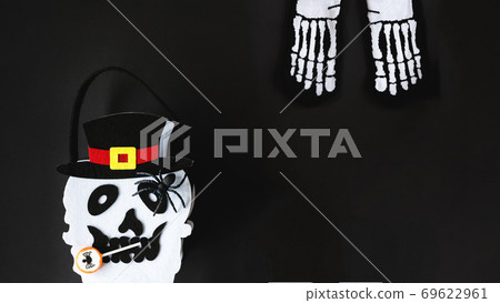 Happy halloween with Jack O Lantern bucket and sceleton feet 69622961