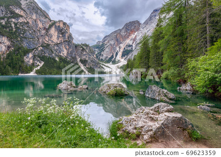 View of the calm waters of the most beautiful lake Bryce, with the reflected alps in it 69623359