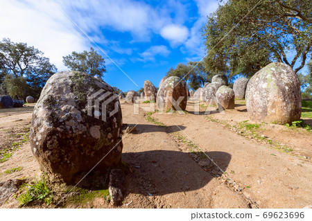 View of the megalithic complex Almendres Cromlech (Cromelelique dos Almendres) Evora View of the megalithic complex Almendres Cromlech (Cromelelique dos Almendres) Evora 69623696