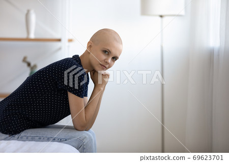 Portrait of sick hairless woman relax at home 69623701