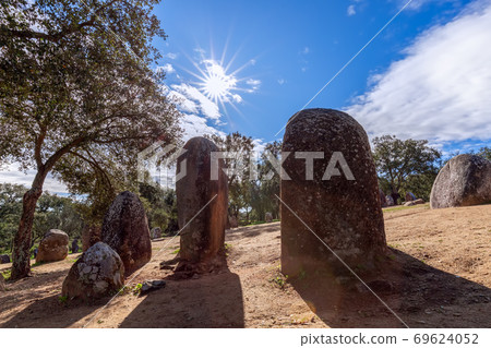 View of the megalithic complex Almendres Cromlech (Cromelelique dos Almendres) Evora View of the megalithic complex Almendres Cromlech (Cromelelique dos Almendres) Evora 69624052