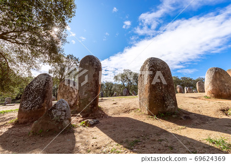 View of the megalithic complex Almendres Cromlech (Cromelelique dos Almendres) Evora View of the megalithic complex Almendres Cromlech (Cromelelique dos Almendres) Evora 69624369
