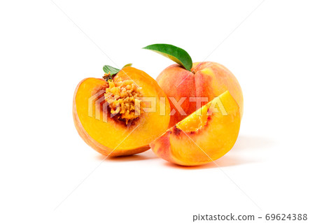 Fresh sweet sliced peach with green leaf isolated on white background. Fresh sweet sliced peach with green leaf isolated on white background. 69624388