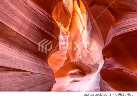 Beautiful view of amazing sandstone formations in famous Antelope Canyon Beautiful view of amazing sandstone formations in famous Antelope Canyon 69625463