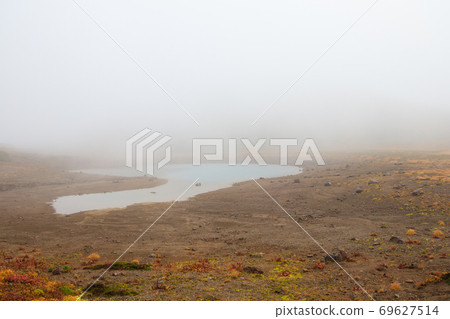 Tsurugaike covered with fog Tsurugaike covered with fog 69627514