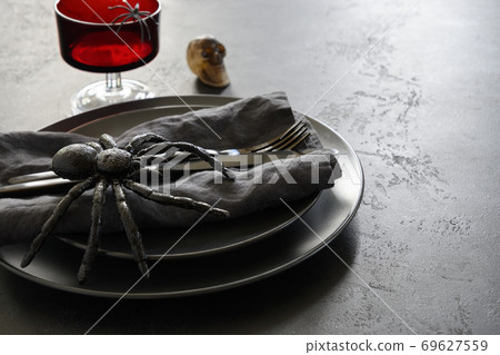 Halloween black table setting with spider 69627559