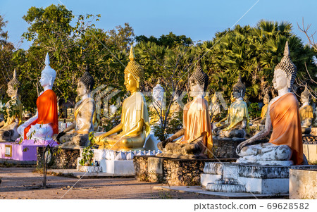 A colorful group of Buddha statues at the Buddhist Cemetery. A colorful group of Buddha statues at the Buddhist Cemetery. 69628582