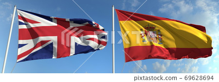 Flying flags of Great Britain and Spain on sky background, 3d rendering Flying flags of Great Britain and Spain on sky background, 3d rendering 69628694