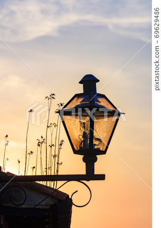 Old street lighting with lantern in colonial style 69629486