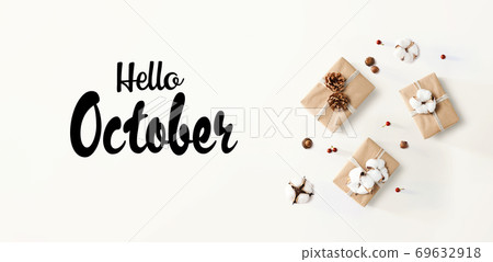Hello October message with gift boxes with cottons Hello October message with gift boxes with cottons 69632918