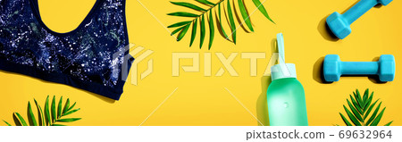 Fitness theme with dumbbells and sports bra Fitness theme with dumbbells and sports bra 69632964