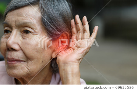 Elderly woman hearing loss , Hard of hearing Elderly woman hearing loss , Hard of hearing 69633586