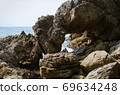 The Big Rock on the Coastline. 69634248