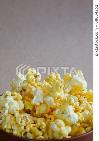Popcorn in the Ceramic Bowl. Popcorn in the Ceramic Bowl. 69634252