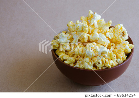 Popcorn in the Ceramic Bowl. Popcorn in the Ceramic Bowl. 69634254
