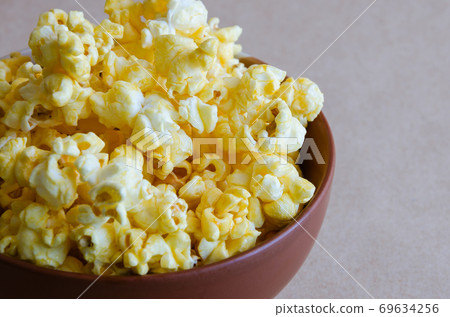Popcorn in the Ceramic Bowl. Popcorn in the Ceramic Bowl. 69634256