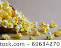 Caramel Popcorn is Spill Out of Bowl. 69634270