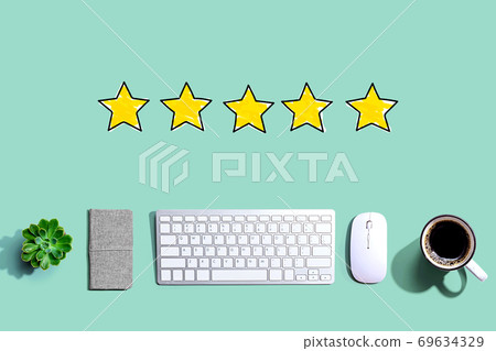 Five star rating with a computer keyboard Five star rating with a computer keyboard 69634329