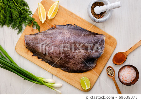 Top view of raw fresh halibut 69639373