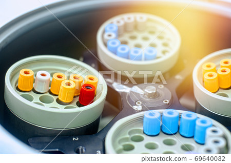 laboratory centrifuge with test tubes with biomaterial laboratory centrifuge with test tubes with biomaterial 69640082