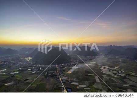 Rice field in harvest time in Bac Son valley, Lang Son, Vietnam Rice field in harvest time in Bac Son valley, Lang Son, Vietnam 69640144