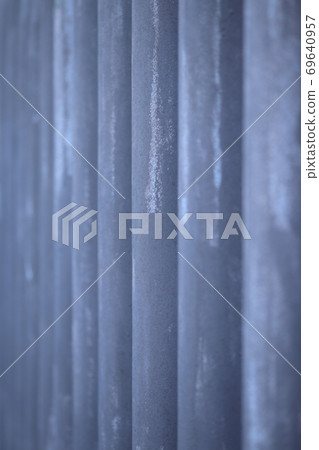 Metal fence with vertical elements for the background 69640957