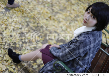 Image of a woman in autumn nature 69641189