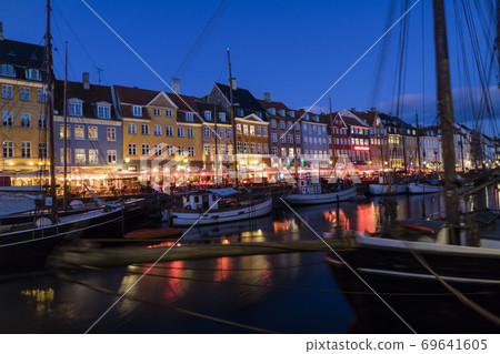 Nyhavn water front canal and touristic street at Copenhagen Nyhavn water front canal and touristic street at Copenhagen 69641605