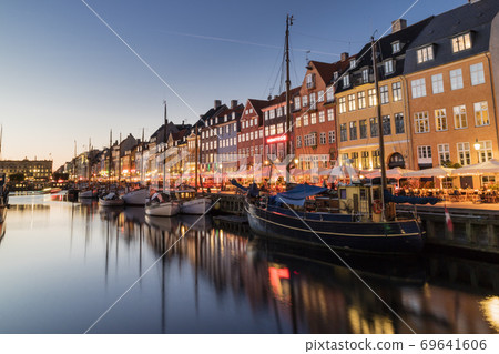Nyhavn water front canal and touristic street at Copenhagen Nyhavn water front canal and touristic street at Copenhagen 69641606