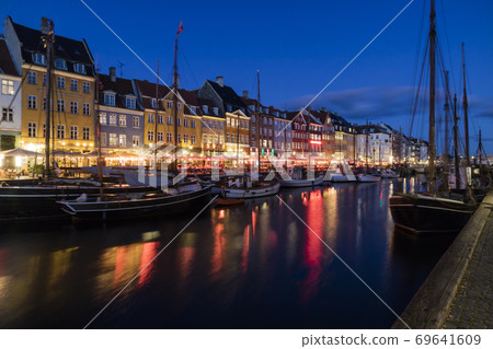 Nyhavn water front canal and touristic street at Copenhagen Nyhavn water front canal and touristic street at Copenhagen 69641609