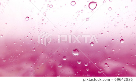 Close-up of water drops on glass surface as background Close-up of water drops on glass surface as background 69642886