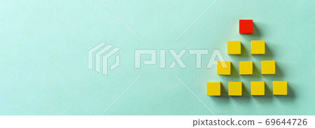 Business material. Pyramid-shaped block. Society, organization, strategy, top-down, plans, ideas, etc. 69644726