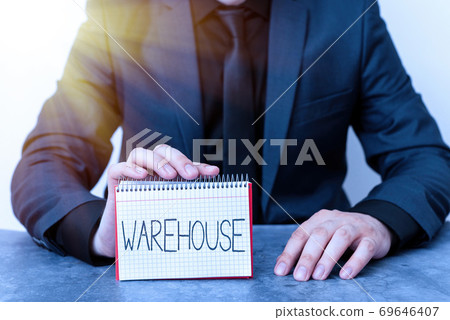 Conceptual hand writing showing Warehouse 69646407