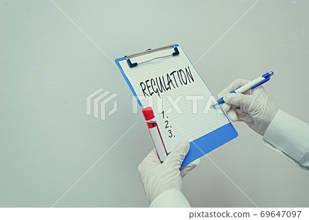 Writing note showing Regulation. Business photo Writing note showing Regulation. Business photo 69647097