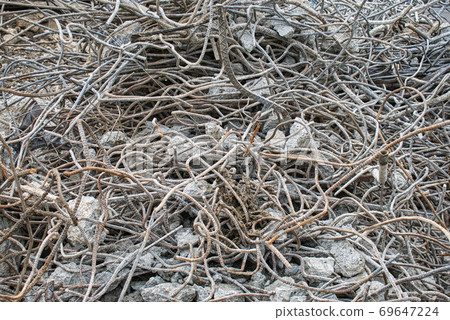 Rubble and rebar scraps removed during demolition work Rubble and rebar scraps removed during demolition work 69647224