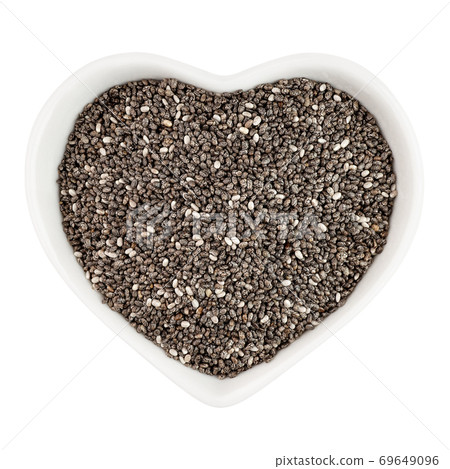 chia seeds in heart shaped plate 69649096