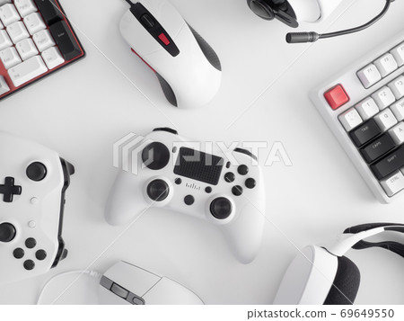 gamer work space concept, top view a gaming gear, mouse, keyboard, joystick and headset. gamer work space concept, top view a gaming gear, mouse, keyboard, joystick and headset. 69649550