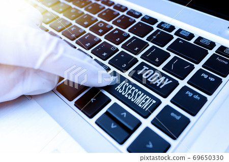 Conceptual hand writing showing Assessment Conceptual hand writing showing Assessment 69650330