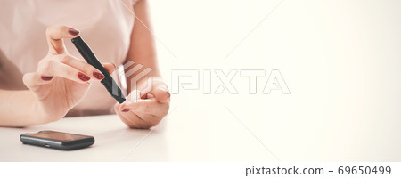 Diabetes checking blood sugar level Diabetes checking blood sugar level 69650499