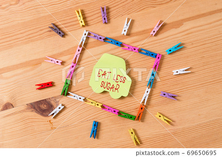 Text sign showing Eat Less Sugar. Conceptual photo Text sign showing Eat Less Sugar. Conceptual photo 69650695