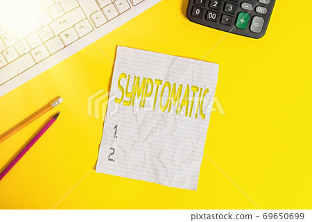 Writing note showing Symptomatic. Business photo Writing note showing Symptomatic. Business photo 69650699