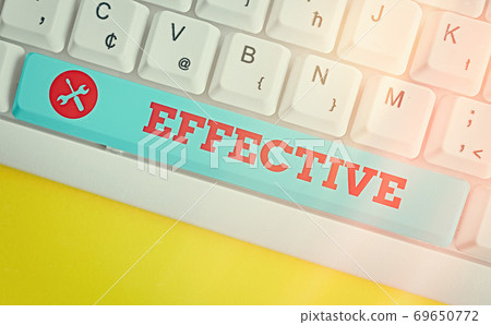 Handwriting text Effective. Concept meaning equal 69650772